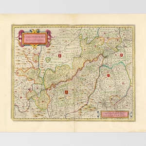 May include: A vintage map titled "Coloniensis Archiepiscopatus" with detailed illustrations of a region. The map features a colorful design with various place names, borders, and decorative elements. The map is printed on aged paper with a cream-colored border.