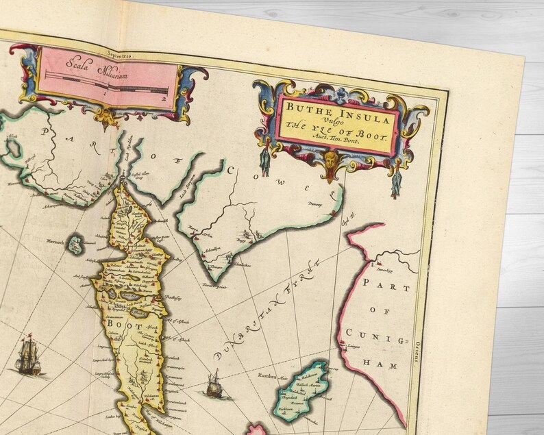 May include: An antique map of "Buthe Insula, Vulgo The Yle of Boot" with a detailed illustration of the island and surrounding waters. The map is printed on aged paper with a yellowed tint and features a decorative border with ornate details.