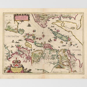 May include: An antique map of the coast of the Netherlands, with detailed illustrations of the islands and waterways. The map is printed on paper and has a decorative border. The text on the map reads "Zuyt of Iuy Island" and "The Bay runneth up in a narrow Labyrinths of Back-shoals."