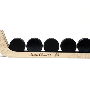 Présentoir personnalisé pour rondelles de hockey