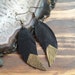 see more listings in the Leather Feather Earrings section