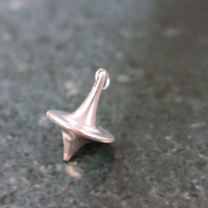 Satin 925 silver spinning top