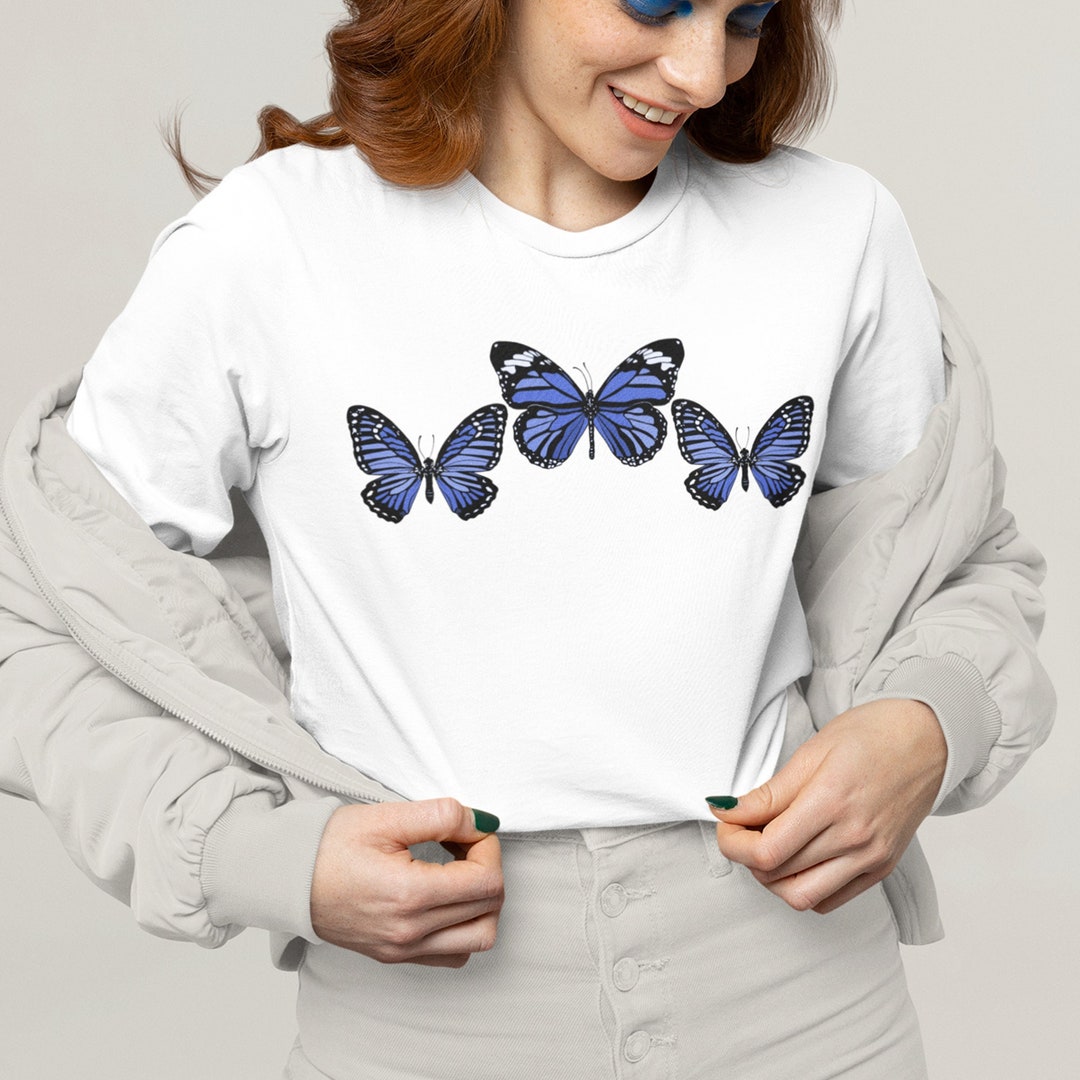light blue butterfly top