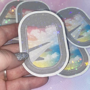 Plane window dreams holo sticker | plane stickers, plane windows, Kawaii stickers, cute stickers, girly stickers