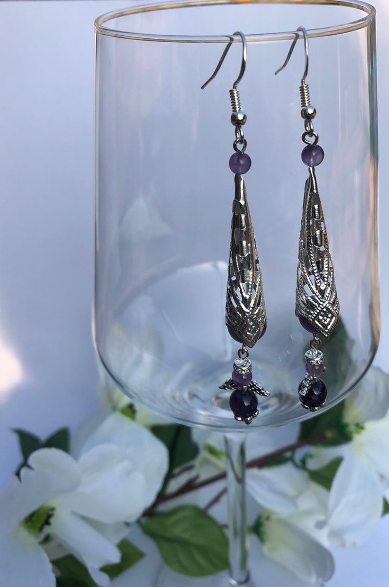 Beautiful earrings with a natural stone bead and a silver ear hook