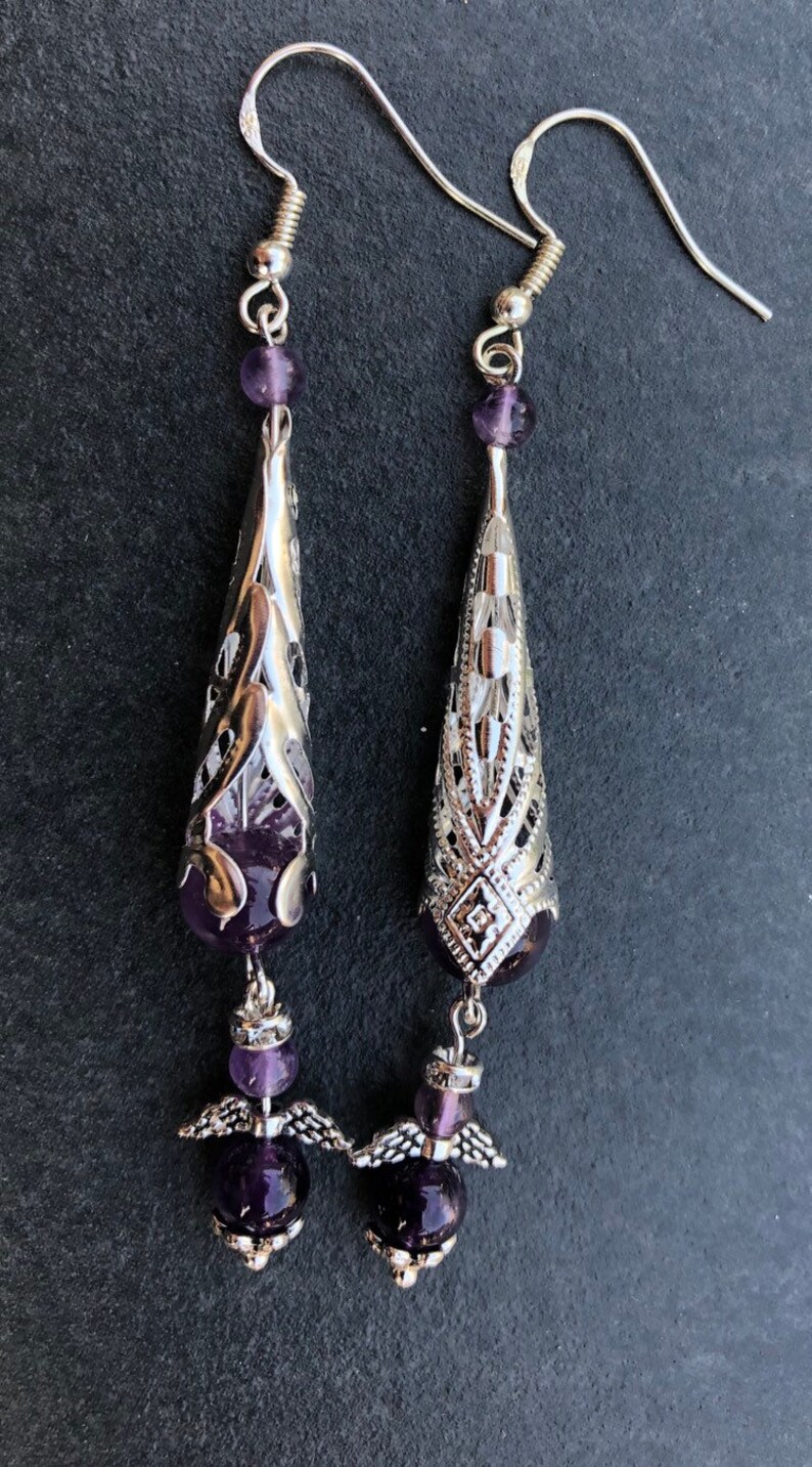 Beautiful earrings with a natural stone bead and a silver ear hook