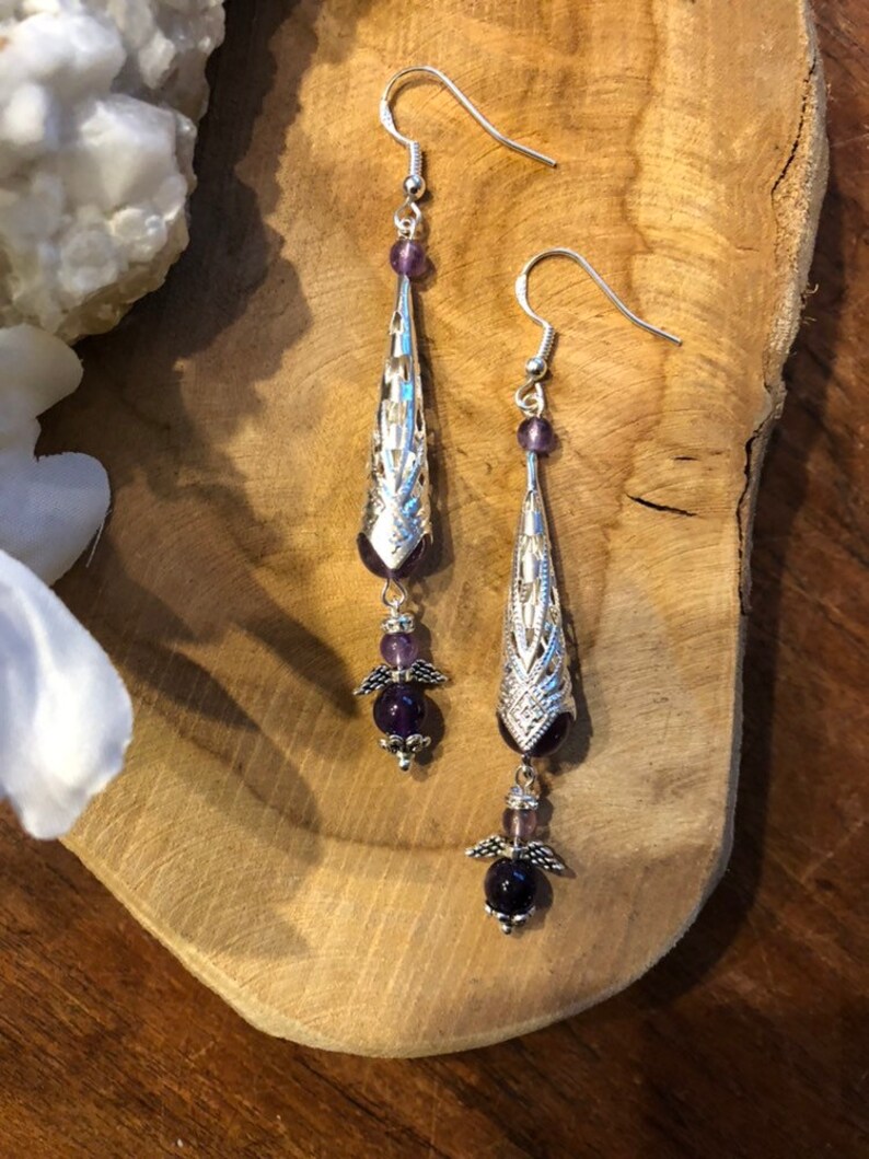 Beautiful earrings with a natural stone bead and a silver ear hook