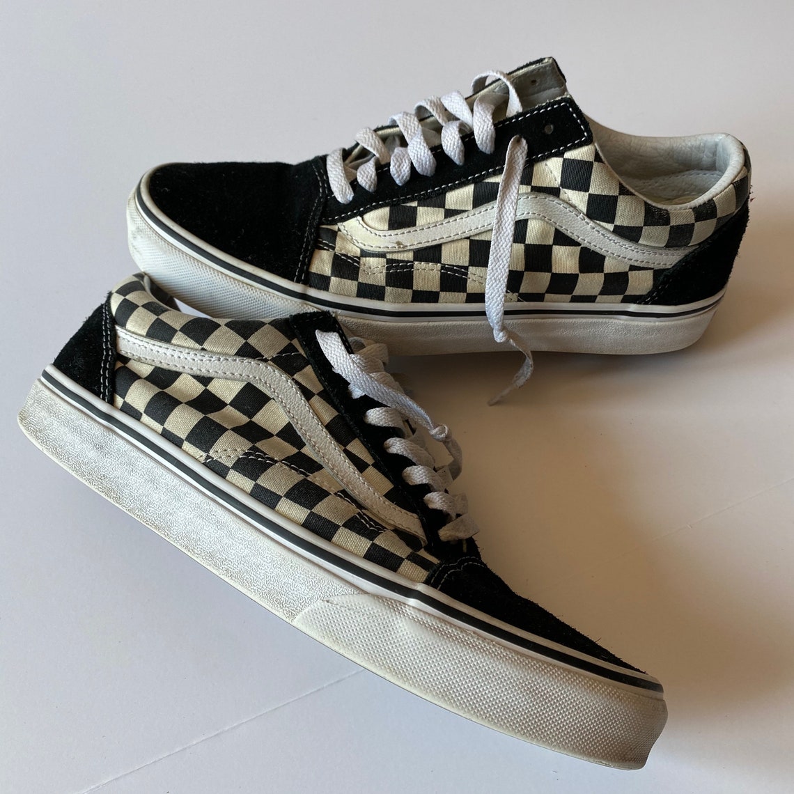 black old skool vans with black laces