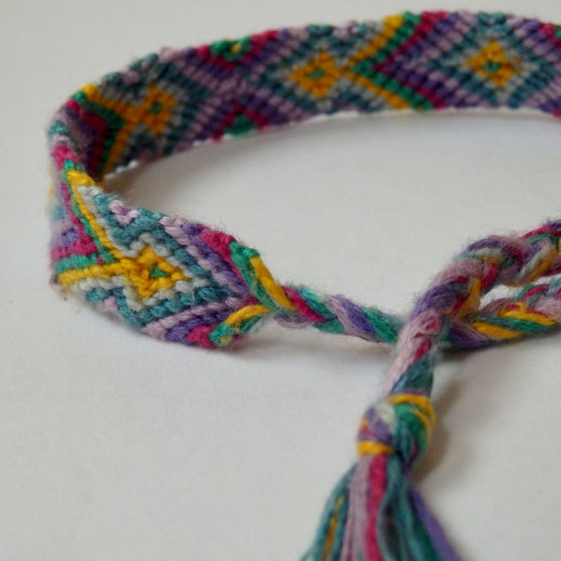 purple yellow diamond pattern vibrant blue multicolor aztec neon hand woven adjustable friendship bracelet