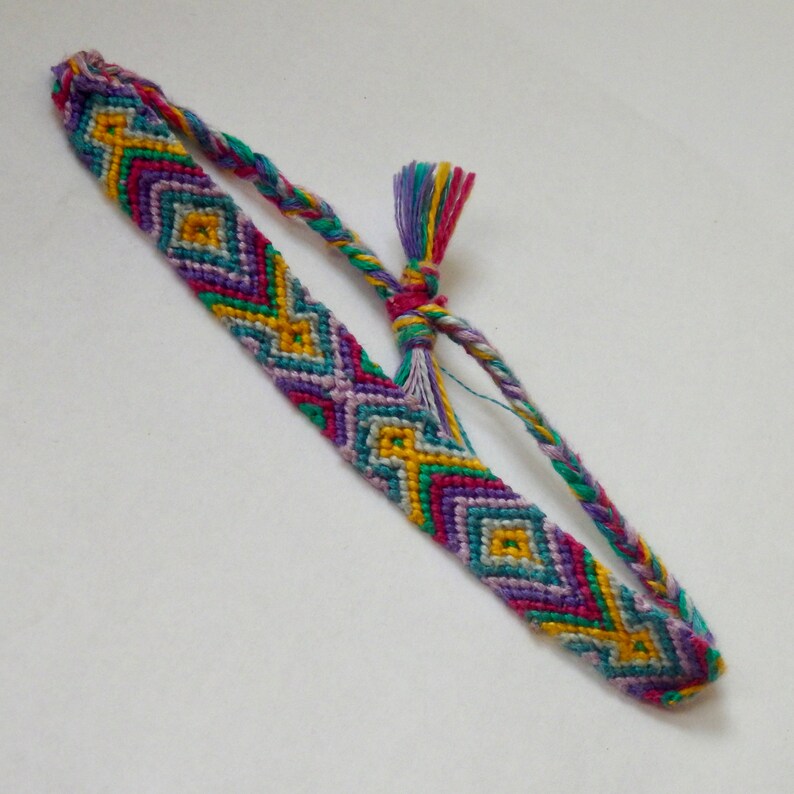purple yellow diamond pattern vibrant blue multicolor aztec neon hand woven adjustable friendship bracelet