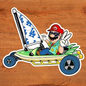 Super Mario conduisant le Surf Sailer de Mario Kart Tour - Los Angeles Dodgers version Autocollant