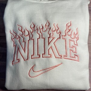 nike flame logo hoodie