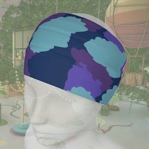 Könnte beinhalten: Ein blaues, violettes und weißes Tarnband. Das Stirnband ist aus weichem, dehnbarem Stoff und perfekt, um die Haare aus dem Gesicht zu halten.