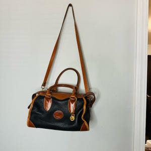 VINTAGE DOONEY & BOURKE Gladstone Black Tan All Weather Leather Crossbody Purse