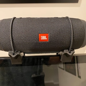 A Peloton compatible speaker shelf for JBL Charge (standard gen 2/3 and Bike+)
