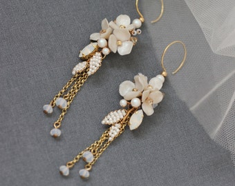 Gold bridal flower earrings with chains and crystals, Ivory wedding dangle earrings with pearls and beads, Beaded white earrings for bride