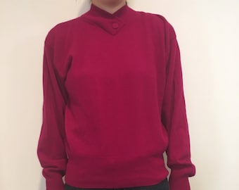 Vintage raspberry merino wool sweater with button detail at collar