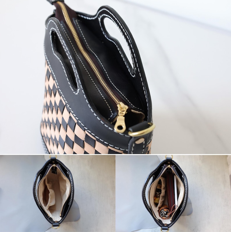 May include: A black leather handbag with a woven tan leather front panel and a gold zipper. The bag has a top handle and a shoulder strap. The bag is open and the inside is empty.