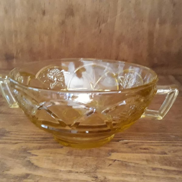 Ornate and Elegant Two Handled Condiment Bowl Nappy Dish in Pale Golden Yellow Glass has Lovely Pressed Glass Details