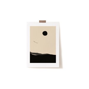 May include: A minimalist art print with a black circle and a thin line against a beige background. The bottom of the print is a black landscape.
