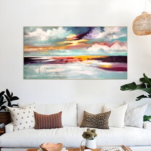 Expressive painting of a coastal scene with bold streaks of color in the sky.