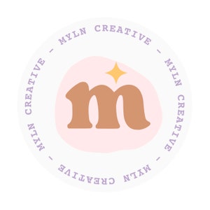 May include: A white circle with the text "MYLN CREATIVE" repeated around the edge. Inside the circle is a pink and white abstract shape with a brown "m" and a gold star.