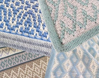 May include: Four different crochet blankets with geometric patterns in shades of blue, white, grey, and pink. The blankets are made with a variety of stitches and textures.