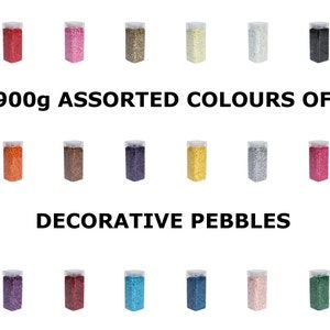 May include: 900g assorted colours of decorative pebbles in small jars. The colours include red, pink, gold, white, black, orange, brown, purple, yellow, silver, pink, blue, red, turquoise, pink, and green.