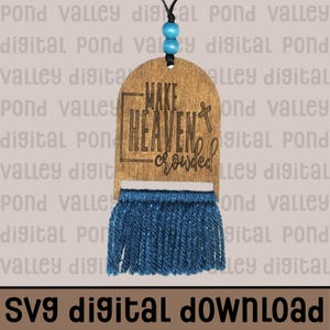May include: Wooden car charm with the phrase "Make Heaven Crowded" and a cross design. The charm has a blue tassel and a black string with blue beads for hanging. The words "SVG digital download" are at the bottom.