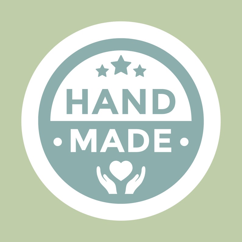 May include: A white circle with a blue circle inside. The blue circle has three white stars, the text "HAND MADE" in white, and a white heart in two white hands.