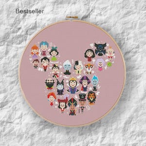 May include: A cross-stitch embroidery hoop featuring a collection of cartoon characters arranged in the shape of a mouse head. The characters are in various colors and styles, set against a pink background. The word "Bestseller" is in the upper left corner.