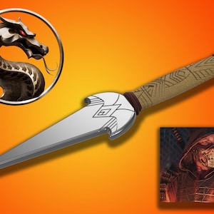 May include: A silver throwing knife with a brown leather wrapped handle and a decorative design on the blade. The knife has a ring on the end of the handle. The Mortal Kombat logo is in the background.