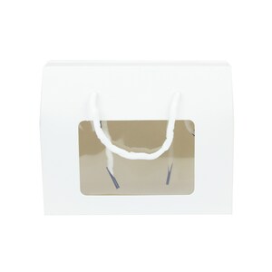 May include: White cardboard gift box with a clear window and white string handles. The box is designed for packaging and gifting small items.