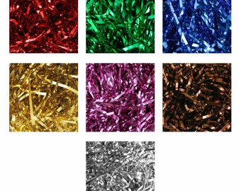 May include: Assortment of metallic shredded paper in six colours: red, green, blue, gold, purple, and silver. The paper is ideal for gift wrapping and crafts.