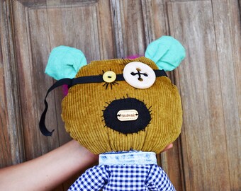 Creepy cute doll with two faces. Weird plush