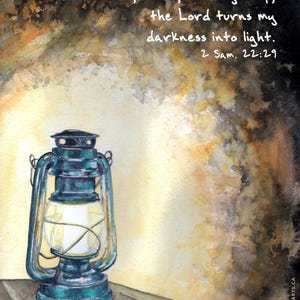 May include: A watercolour painting of an old-fashioned oil lamp with a glowing light inside. The background is a dark brown with a yellow glow coming from the lamp. The text "You, Lord, are my lamp; the Lord turns my darkness into light. 2 Sam. 22:29" is written in white at the top of the image.