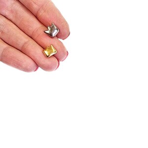 Crown stud earrings, ceramic mismatch earrings in golden and platinum color