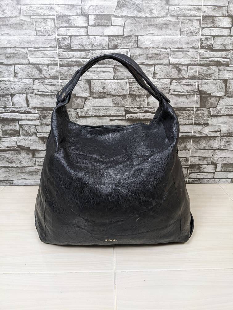 Handbags of the 1990's – River City Leather