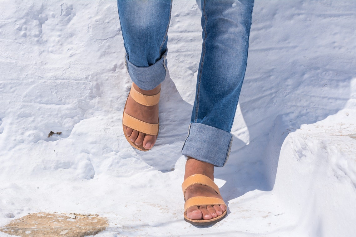 man wearing gladiator sandals
