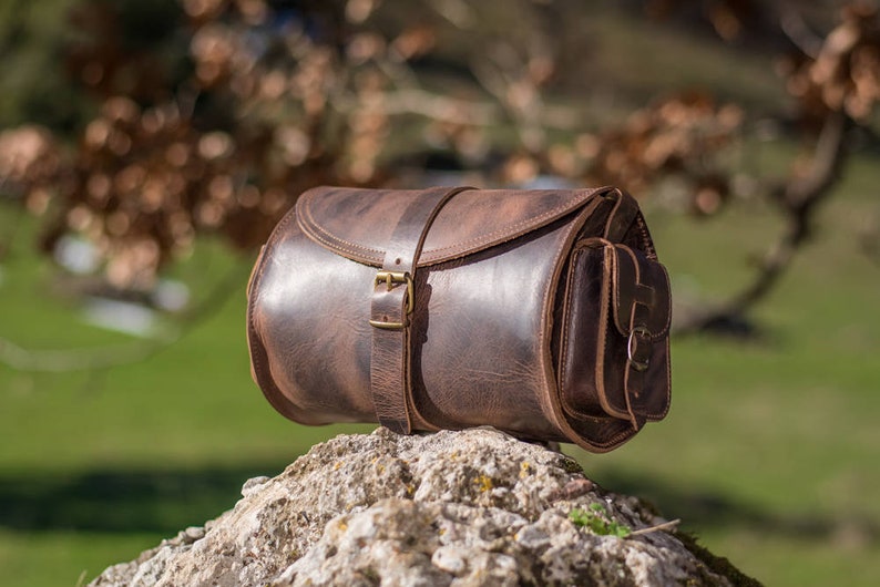 Women's brown leather barrel crossbody purse, tube saddle bag handmade in Greece with full grain cowhide leather KYANIA image 1