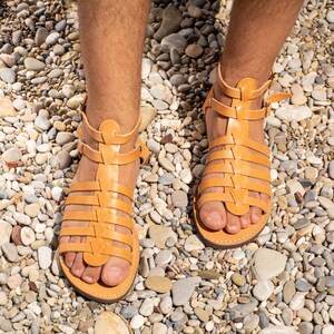 tan roman sandals