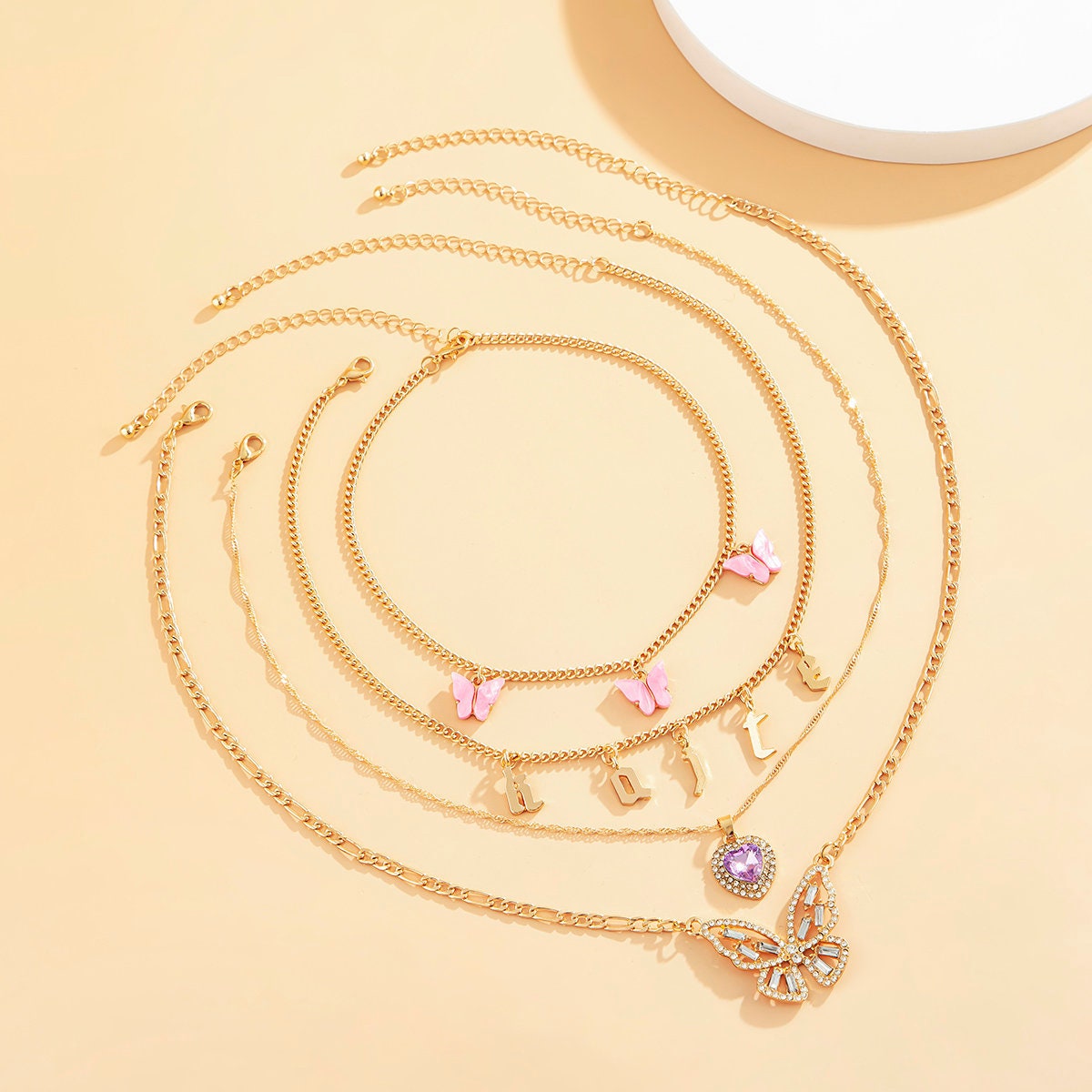 Download Boho Layered Crystal Butterfly Heart & Old English Letter ...