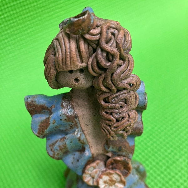 weird, unique pottery sculpture, clay little girl, long hair, handmade hand, sculpted