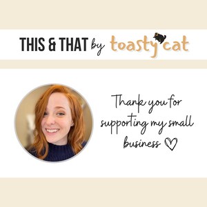 May include: A woman with red hair smiles at the camera. The text "THIS & THAT by toasty cat" is above her and the text "Thank you for supporting my small business" is below her.