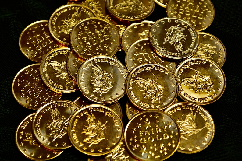 20 large golden eloquintly designed ToothFairy Coins! One for each baby tooth your child will lose.