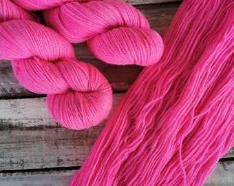 BARBIE PINK on  handdyed GOLD Sparkle Sock Yarn Fingering Weight 4ply