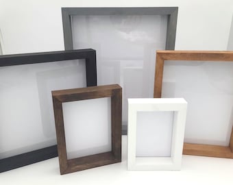 Picture frames. Choose your size and color! Handmade solid wood frames! Free shipping! Can hang in either direction or sit on a shelf.