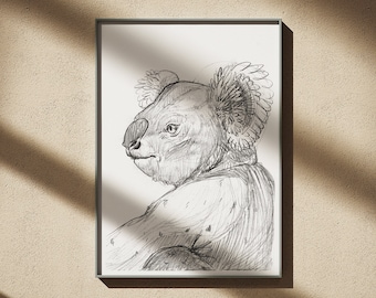 May include: A framed pencil sketch of a koala bear, rendered in grayscale. The koala is depicted in profile, with detailed fur and facial features. The artwork is set against a neutral background, with shadows.
