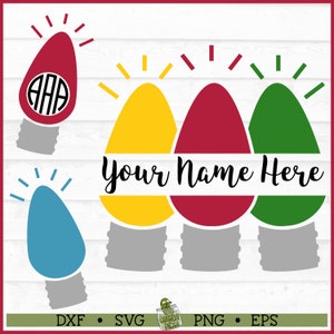 Puede incluir: Tres bombillas de Navidad en amarillo, rojo y verde con una pancarta blanca que dice "Your Name Here". Hay una bombilla más pequeña en azul y una bombilla roja con un monograma.
