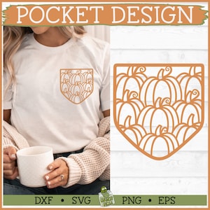 May include: A white t-shirt with a pocket design featuring an outline of a pumpkin patch. The pocket design is a silhouette of multiple pumpkins with stems.